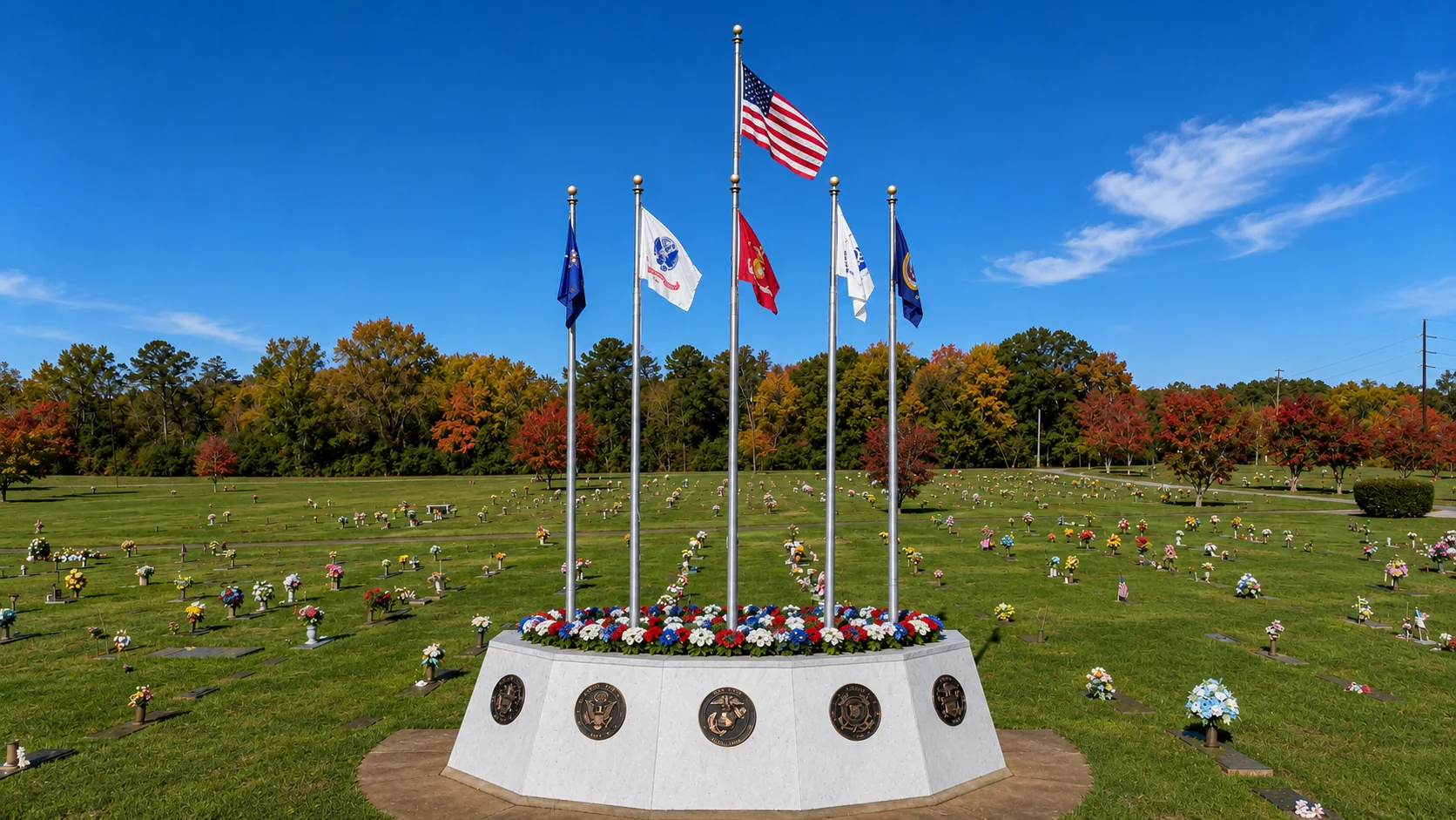 Military service flags and the veterans memorial at Pineview Memory Gardens